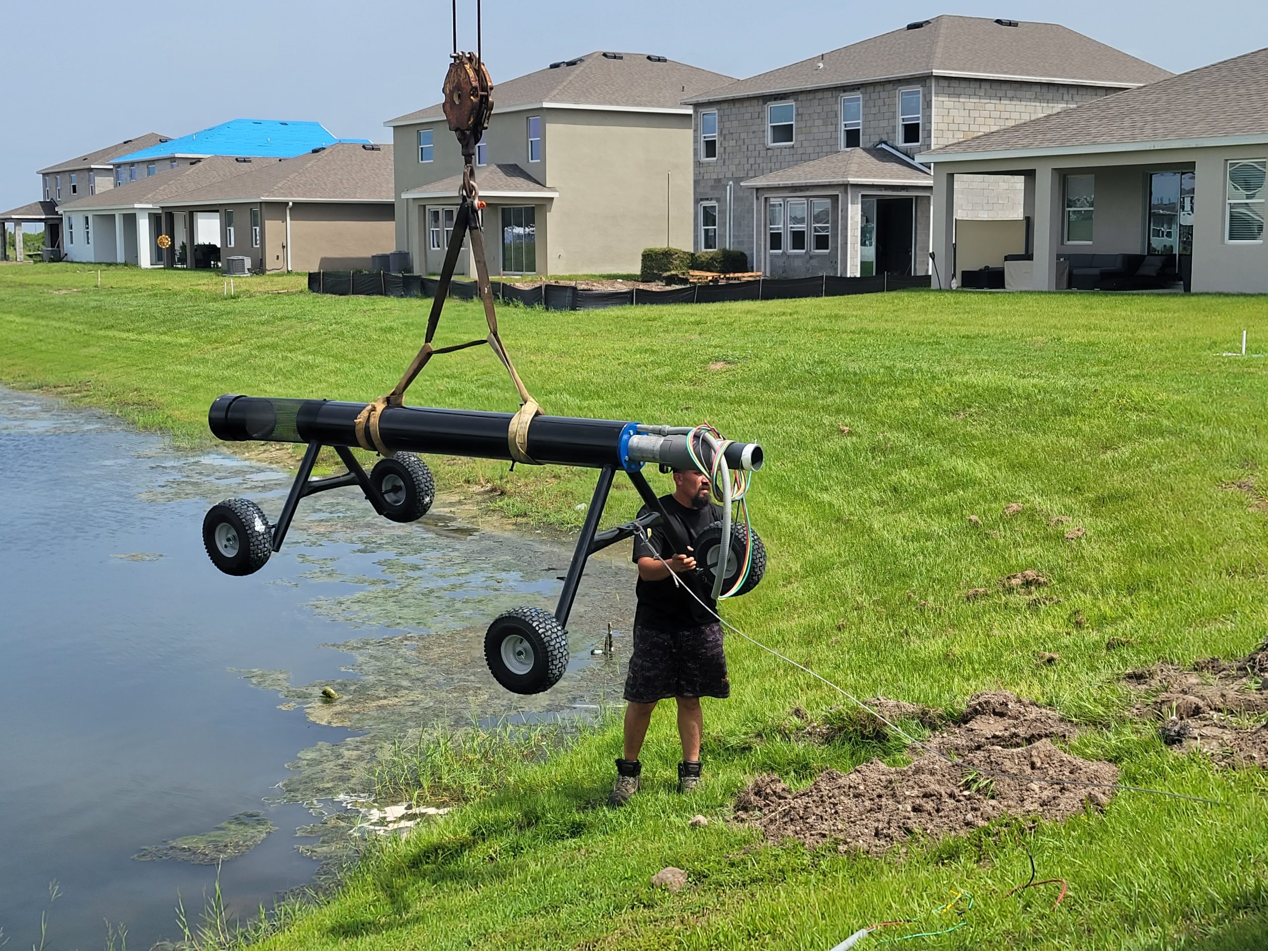 Technician performing commercial pump system service Spring Hill during an on-site inspection