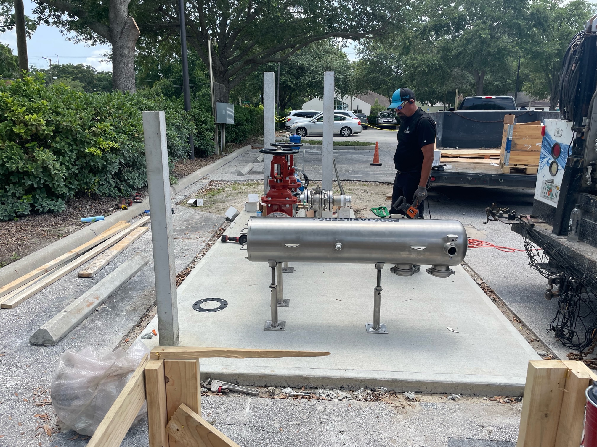 Technician performing well pump repair at a Mulberry Florida residential property