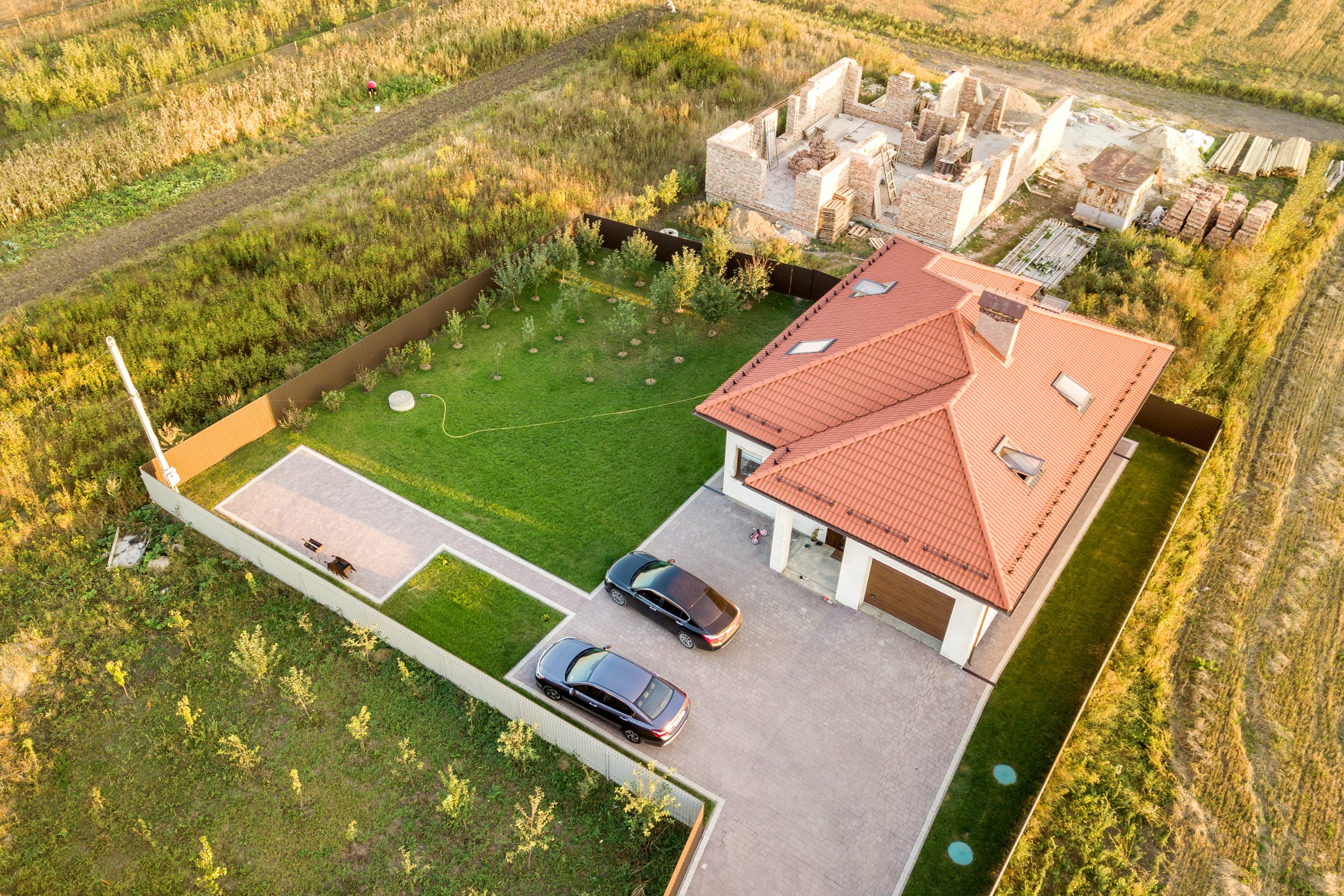 Aerial view of Hudson home property where well pump installation checklist applies
